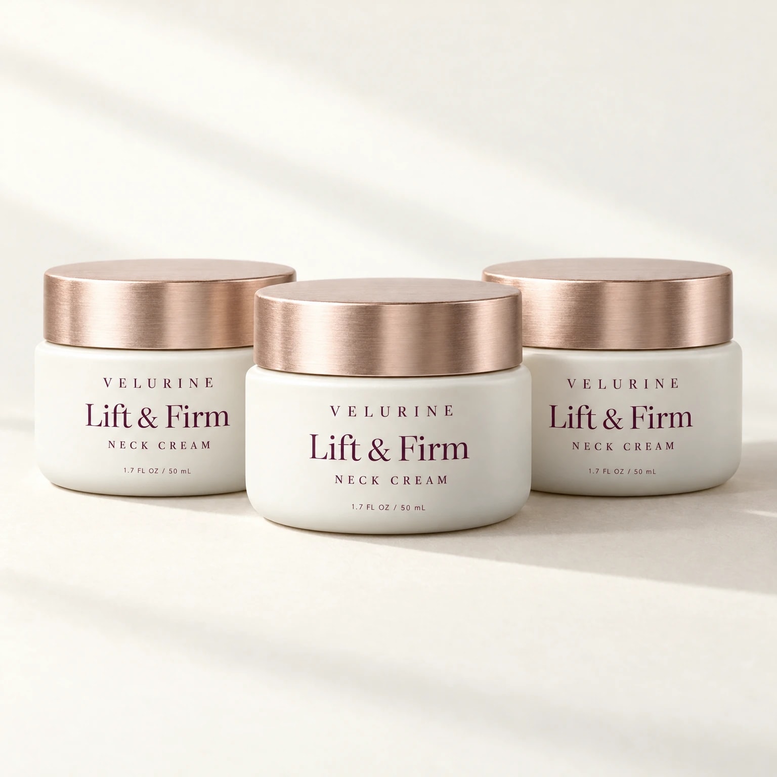 Three jars of Velurine Lift & Firm Neck Cream